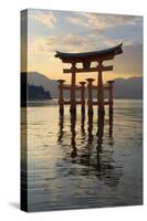 The Floating Miyajima Torii Gate of Itsukushima Shrine at Sunset-Stuart Black-Stretched Canvas