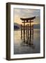 The Floating Miyajima Torii Gate of Itsukushima Shrine at Sunset-Stuart Black-Framed Photographic Print