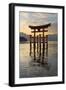 The Floating Miyajima Torii Gate of Itsukushima Shrine at Sunset-Stuart Black-Framed Photographic Print