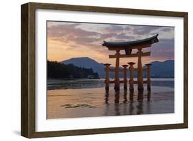 The Floating Miyajima Torii Gate of Itsukushima Shrine at Sunset-Stuart Black-Framed Photographic Print