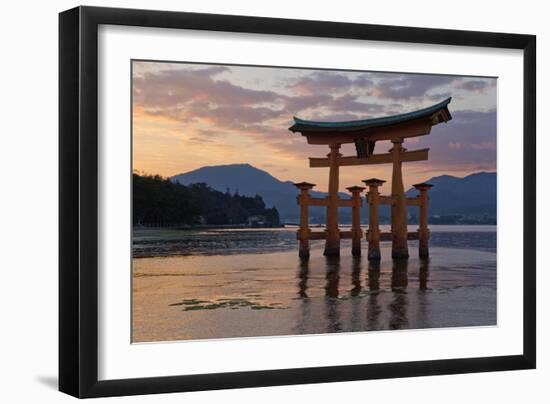 The Floating Miyajima Torii Gate of Itsukushima Shrine at Sunset-Stuart Black-Framed Photographic Print