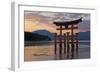 The Floating Miyajima Torii Gate of Itsukushima Shrine at Sunset-Stuart Black-Framed Photographic Print