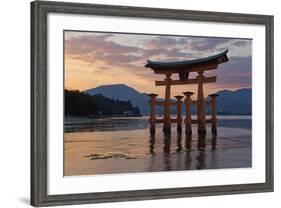 The Floating Miyajima Torii Gate of Itsukushima Shrine at Sunset-Stuart Black-Framed Photographic Print