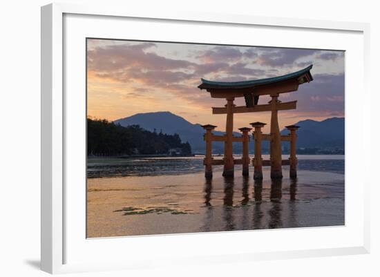 The Floating Miyajima Torii Gate of Itsukushima Shrine at Sunset-Stuart Black-Framed Photographic Print