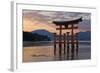 The Floating Miyajima Torii Gate of Itsukushima Shrine at Sunset-Stuart Black-Framed Photographic Print