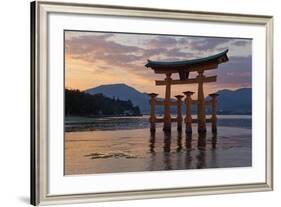 The Floating Miyajima Torii Gate of Itsukushima Shrine at Sunset-Stuart Black-Framed Photographic Print