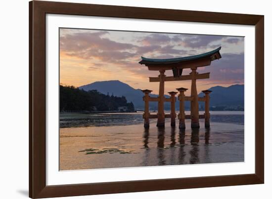 The Floating Miyajima Torii Gate of Itsukushima Shrine at Sunset-Stuart Black-Framed Photographic Print