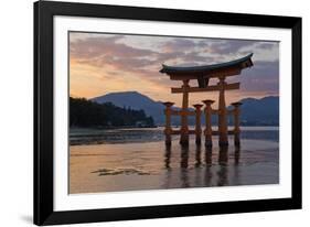 The Floating Miyajima Torii Gate of Itsukushima Shrine at Sunset-Stuart Black-Framed Photographic Print