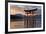 The Floating Miyajima Torii Gate of Itsukushima Shrine at Sunset-Stuart Black-Framed Photographic Print