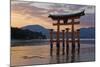 The Floating Miyajima Torii Gate of Itsukushima Shrine at Sunset-Stuart Black-Mounted Photographic Print