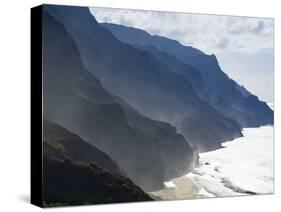 The Fluted Ridges of the Na Pali Coast Above the Crashing Surf on the North Shore of Kauai, Hawaii.-Sergio Ballivian-Stretched Canvas