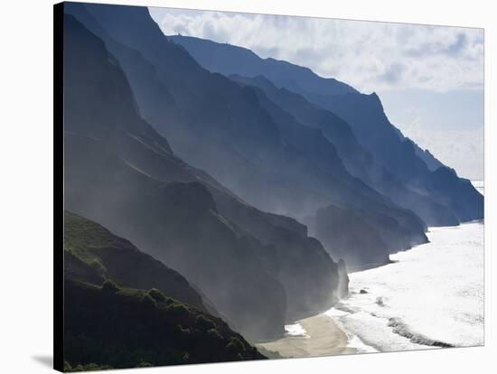 The Fluted Ridges of the Na Pali Coast Above the Crashing Surf on the North Shore of Kauai, Hawaii.-Sergio Ballivian-Stretched Canvas