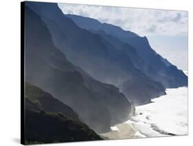 The Fluted Ridges of the Na Pali Coast Above the Crashing Surf on the North Shore of Kauai, Hawaii.-Sergio Ballivian-Stretched Canvas