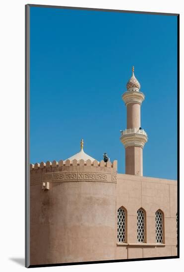 The fort of Nizwa. A scenic view of the fort at Nizwa, and its minaret. Nizwa, Oman.-Sergio Pitamitz-Mounted Photographic Print