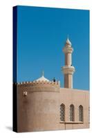 The fort of Nizwa. A scenic view of the fort at Nizwa, and its minaret. Nizwa, Oman.-Sergio Pitamitz-Stretched Canvas