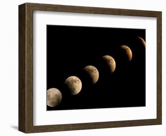 The Full Moon Slowly Loses its Fullness as the Earth's Shadow Crosses It-null-Framed Photographic Print