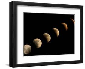 The Full Moon Slowly Loses its Fullness as the Earth's Shadow Crosses It-null-Framed Photographic Print