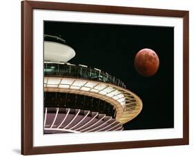 The Full Moon Turns Red and Orange as It Passes the Space Needle-null-Framed Photographic Print