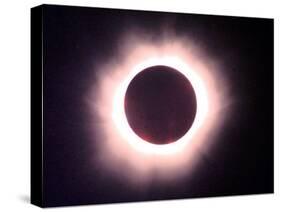 The Full Solar Eclipse is Seen in Saint Pierre Du Port Near Normandy, France-null-Stretched Canvas