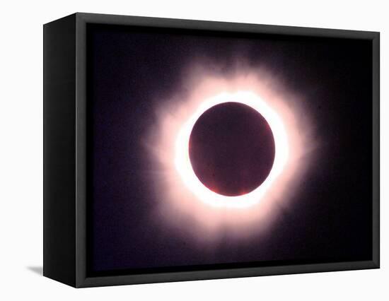 The Full Solar Eclipse is Seen in Saint Pierre Du Port Near Normandy, France-null-Framed Stretched Canvas