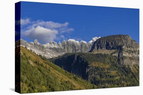 The Garden Wall and Haystack Butte with seasons first snow in Glacier National Park, Montana, USA-Chuck Haney-Stretched Canvas