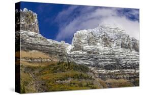 The Garden Wall with seasons first snow in Glacier National Park, Montana, USA-Chuck Haney-Stretched Canvas