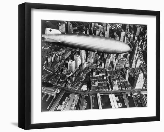 The German Airship, the Hindenburg, above Manhattan, New York in 1936, on its Way to its Berth at L-null-Framed Photographic Print