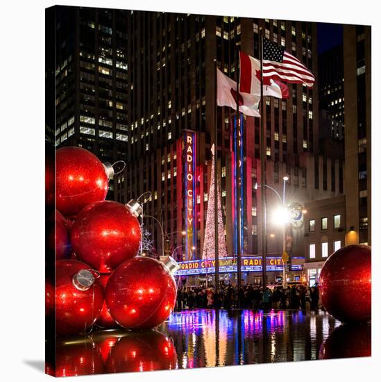 The Giant Christmas Ornaments on Sixth Avenue across from the Radio City Music Hall by Night-Philippe Hugonnard-Stretched Canvas