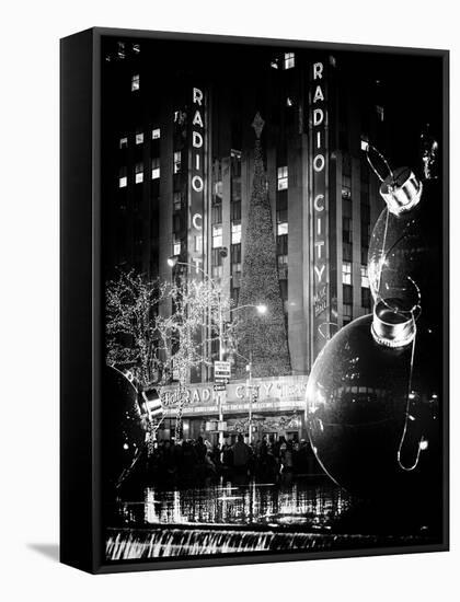 The Giant Christmas Ornaments on Sixth Avenue across from the Radio City Music Hall by Night-Philippe Hugonnard-Framed Stretched Canvas