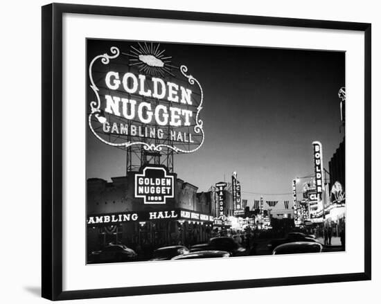 The Golden Nugget Gambling Hall Lighting Up Like a Candle-J. R. Eyerman-Framed Photographic Print