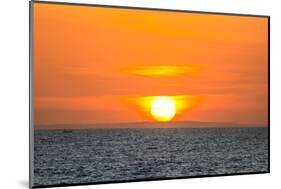 The golden setting sun reflects a gold glow on the beach at Pererenan Beach, Bali, Indonesia-Greg Johnston-Mounted Photographic Print