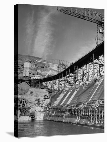 The Grand Coulee Dam under Construction with a Sign in the Bkgrd. That Says: "Safety Pays"-Alfred Eisenstaedt-Stretched Canvas