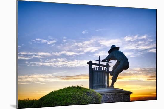 The Grape Crusher Statue agains Dramatic Sky, Napa Valley, California-George Oze-Mounted Photographic Print