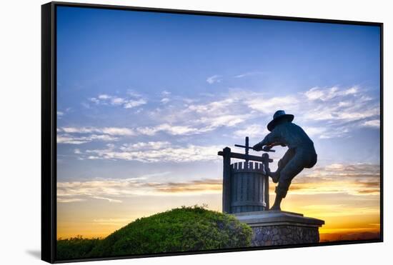 The Grape Crusher Statue agains Dramatic Sky, Napa Valley, California-George Oze-Framed Stretched Canvas