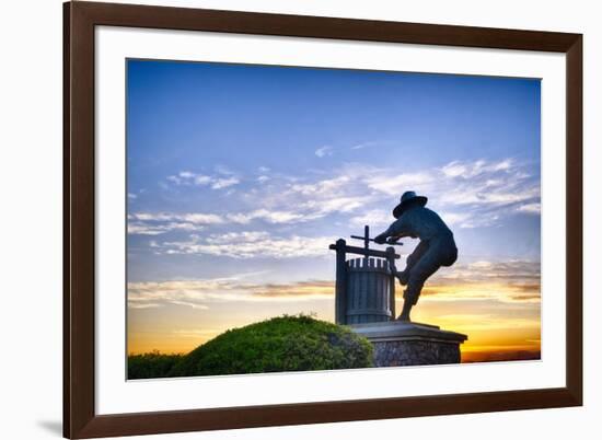 The Grape Crusher Statue agains Dramatic Sky, Napa Valley, California-George Oze-Framed Photographic Print