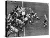 The Green Bay Packers Playing a Game-George Silk-Stretched Canvas