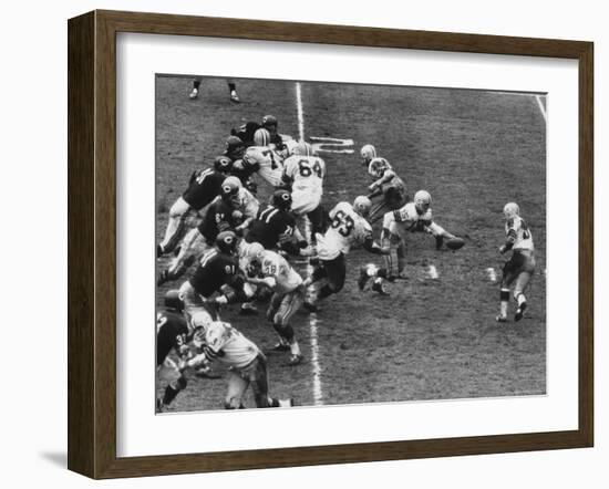 The Green Bay Packers Playing a Game-George Silk-Framed Premium Photographic Print