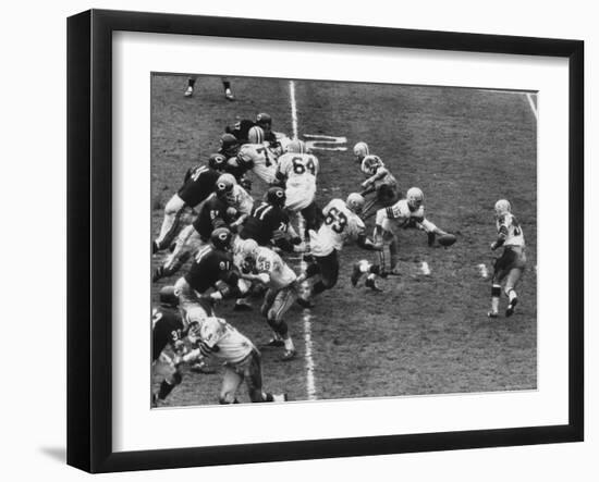 The Green Bay Packers Playing a Game-George Silk-Framed Premium Photographic Print