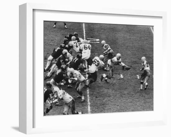 The Green Bay Packers Playing a Game-George Silk-Framed Premium Photographic Print