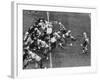 The Green Bay Packers Playing a Game-George Silk-Framed Premium Photographic Print