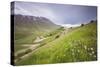 The green hills in bloom frame the medieval village, Castelluccio di Norcia, Umbria, Italy-Roberto Moiola-Stretched Canvas