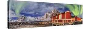 The Green Light of the Aurora Borealis Lights Up Fishermans Cabins-ClickAlps-Stretched Canvas
