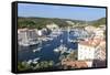 The green vegetation frames the medieval town and harbour, Bonifacio, Corsica, France, Mediterranea-Roberto Moiola-Framed Stretched Canvas