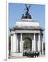 The Grenadier Guards pass through Wellington Arch at Hyde Park Corner-Associated Newspapers-Framed Photo