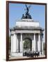 The Grenadier Guards pass through Wellington Arch at Hyde Park Corner-Associated Newspapers-Framed Photo