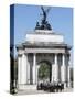 The Grenadier Guards pass through Wellington Arch at Hyde Park Corner-Associated Newspapers-Stretched Canvas