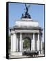 The Grenadier Guards pass through Wellington Arch at Hyde Park Corner-Associated Newspapers-Framed Stretched Canvas