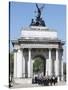 The Grenadier Guards pass through Wellington Arch at Hyde Park Corner-Associated Newspapers-Stretched Canvas