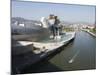 The Guggenheim, Designed by Canadian-American Architect Frank Gehry, on the Nervion River-Christian Kober-Mounted Photographic Print