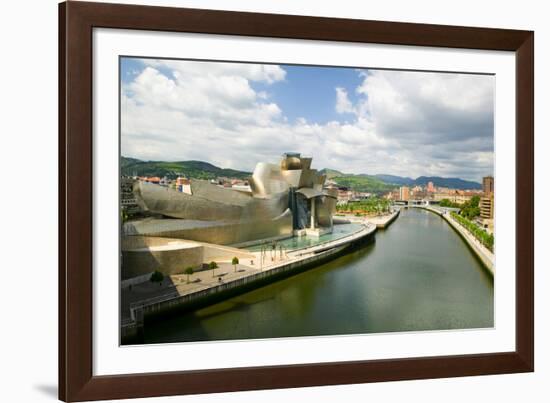 The Guggenheim Museum of Contemporary Art of Bilbao (Bilbo) on the river Ibaizabal, located on t...-null-Framed Photographic Print